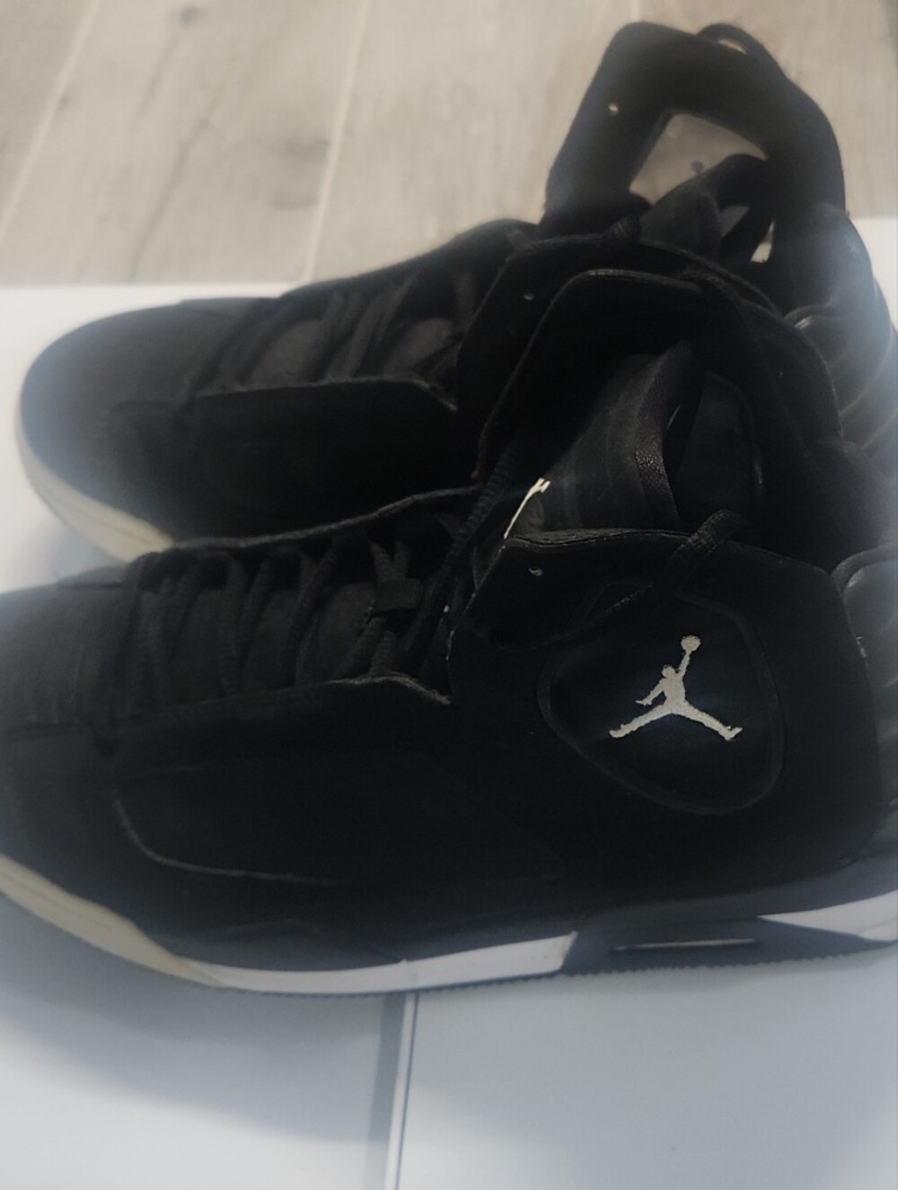 Jordan Men’s Black and White High-Top Sneakers